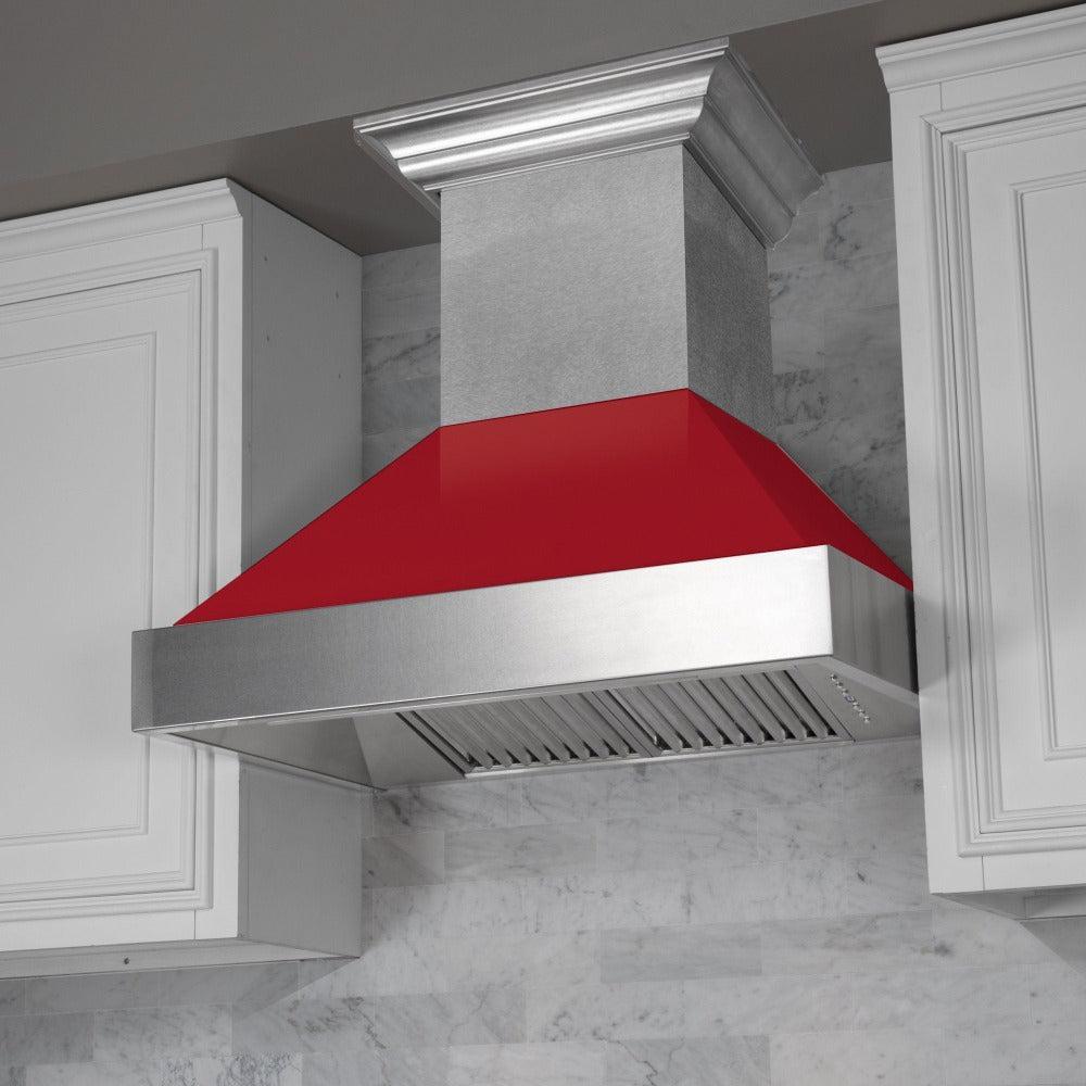 ZLINE Ducted Fingerprint Resistant Stainless Steel Range Hood with Red Gloss Shell (8654RG) with a short chimney in a kitchen.