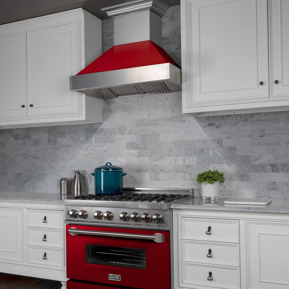 ZLINE Ducted Fingerprint Resistant Stainless Steel Range Hood with Red Gloss Shell (8654RG) in a luxury kitchen above matching range, side.