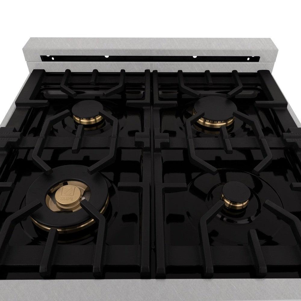 ZLINE brass burners on black porcelain cooktop with cast-iron grates.