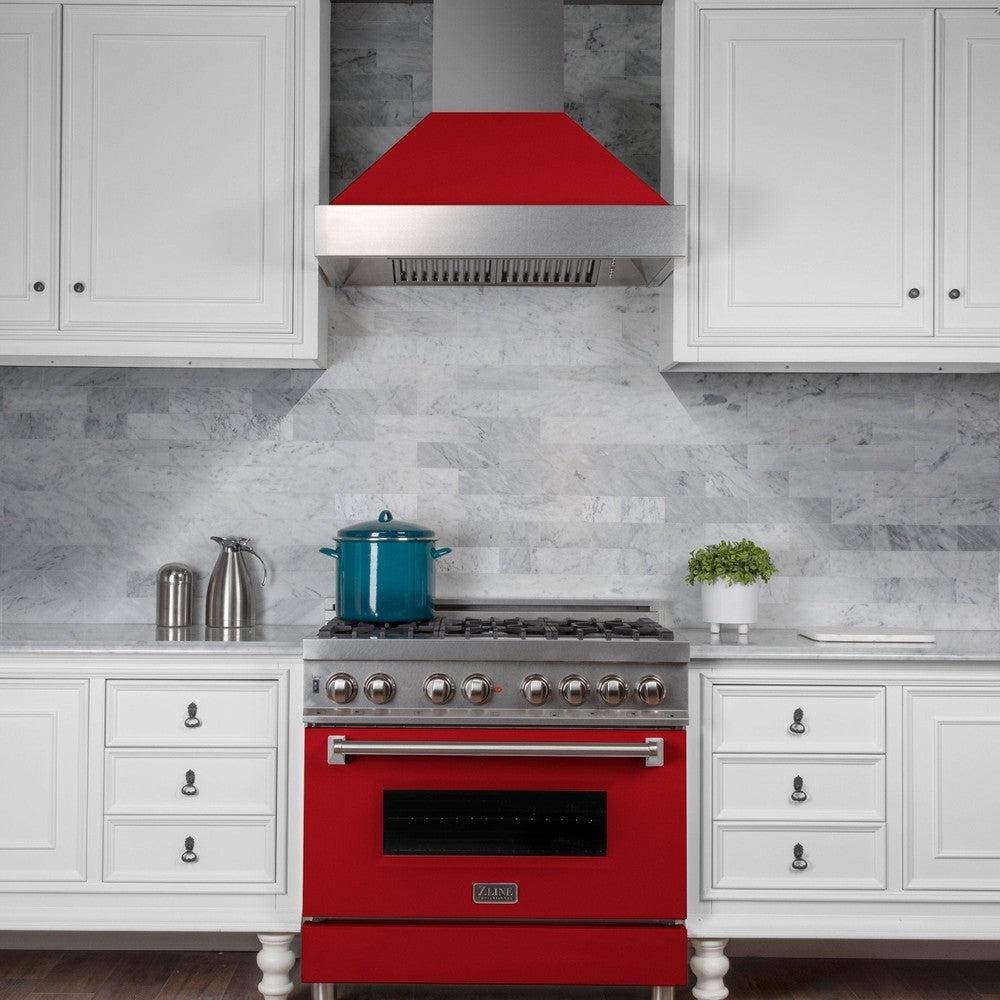 ZLINE Ducted Fingerprint Resistant Stainless Steel Range Hood with Red Matte Shell (8654RM) in a luxury kitchen, front.