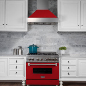 ZLINE Ducted Fingerprint Resistant Stainless Steel Range Hood with Red Matte Shell (8654RM) in a luxury kitchen, front.