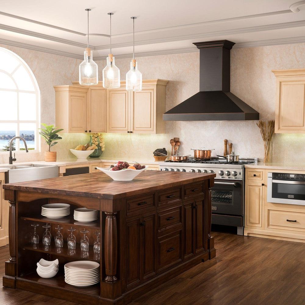 ZLINE Designer Series Wall Mount Range Hood in Oil-Rubbed Bronze (8667B) in a farmhouse-style kitchen wide.