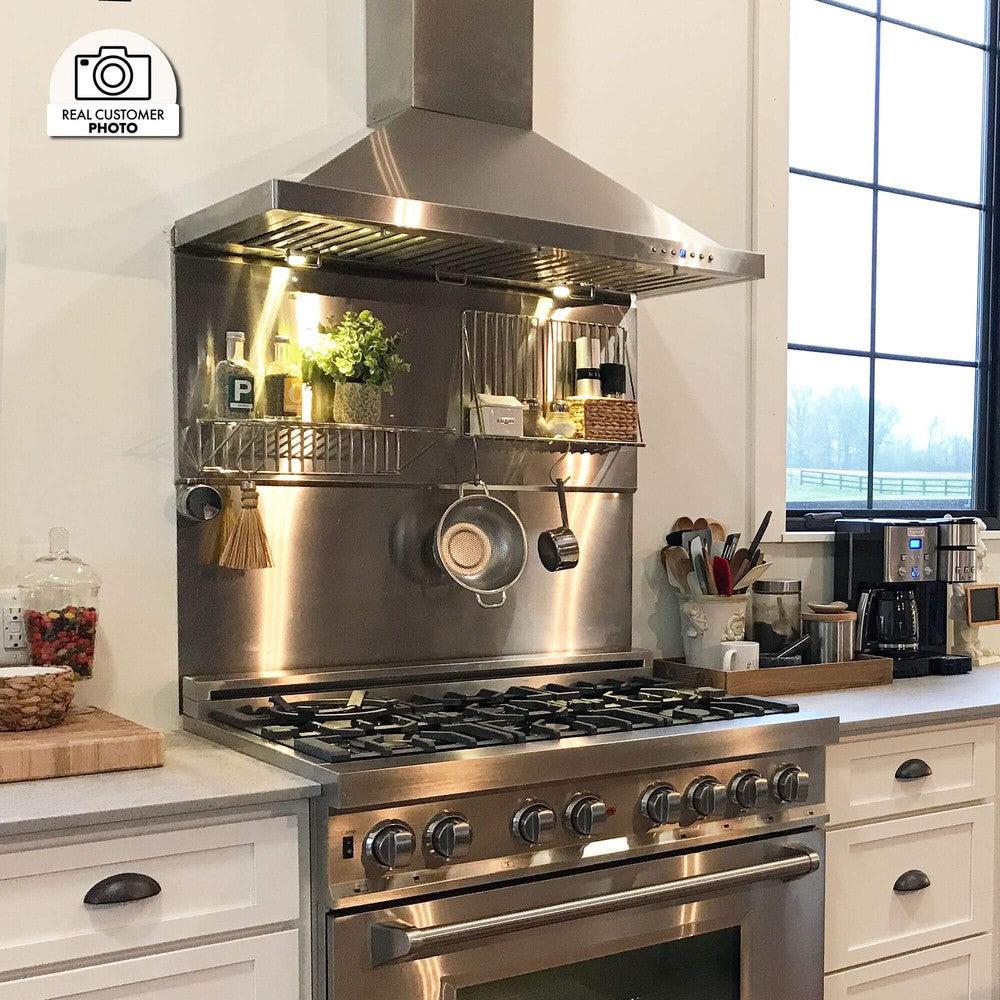 ZLINE Convertible Vent Outdoor Approved Wall Mount Range Hood in Stainless Steel (KB-304) above a matching range.