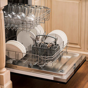 Built-in top control dishwasher with dishes and utensils on bottom rack and glassware on top rack