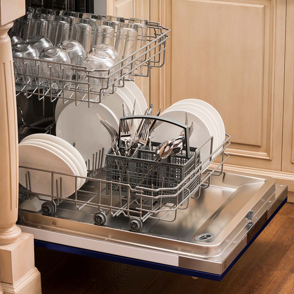 Built-in top control dishwasher with dishes and utensils on bottom rack and glassware on top rack