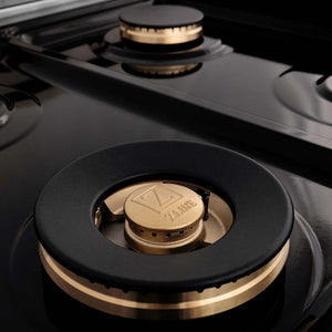 ZLINE brass burners on black porcelain cooktop.