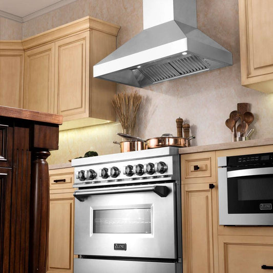 ZLINE Professional Convertible Vent Wall Mount Range Hood in Stainless Steel with Crown Molding (597CRN) in a farmhouse-style kitchen, below.