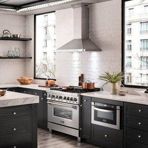 ZLINE CrownSound Ducted Vent Wall Mount Range Hood in Stainless Steel with Built-in Bluetooth Speakers (KBCRN-BT) in a modern apartment kitchen.