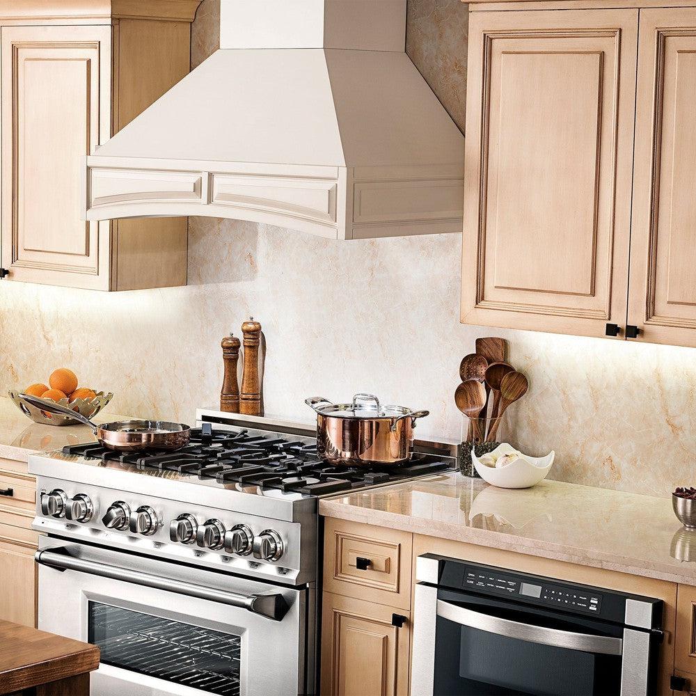 ZLINE Wooden Wall Mount Range Hood in White (321TT) in a farmhouse kitchen, close-up.